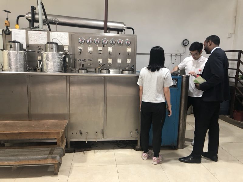 Alexander reviewing supercritical extraction system