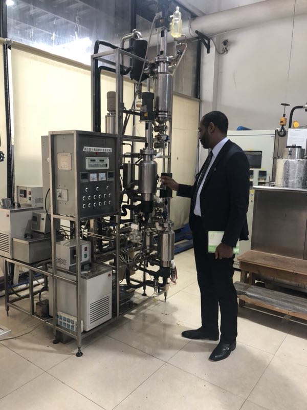 Team evaluating industrial process equipment